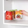 DISPENSING CLOSURES FOR SPICE BAGS, ON SUSPENSION BAR